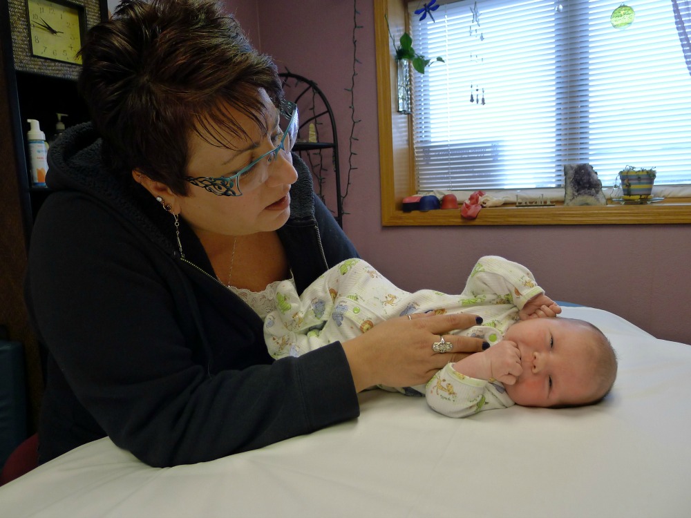 Tami Goldstein with an infant